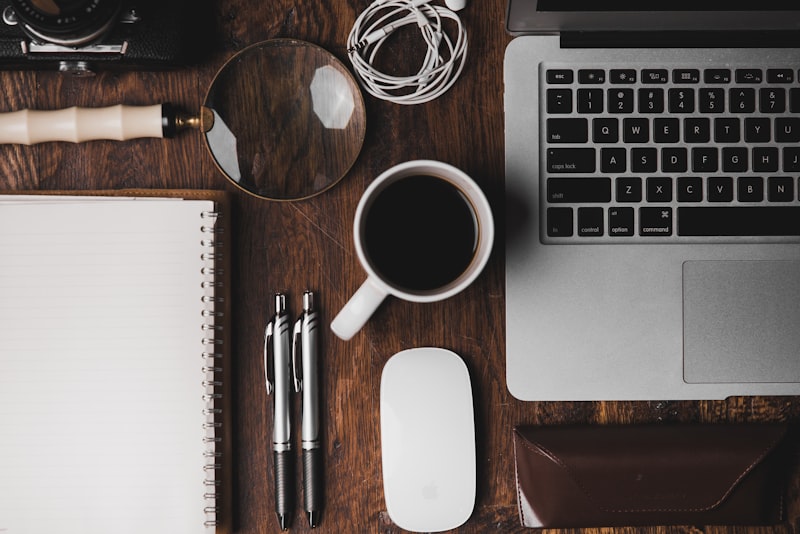 A tidy home-office desk with a laptop