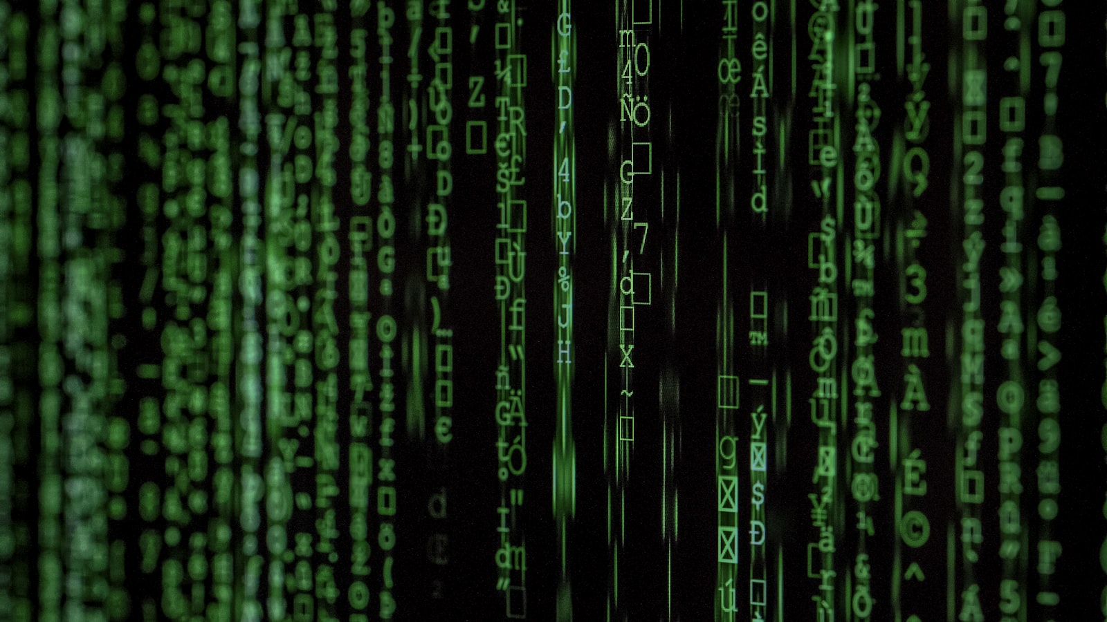 Lines of green code on a dark computer screen
