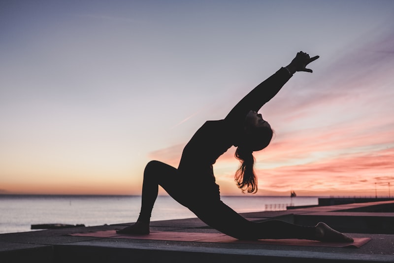 A person stretching during a break from work
